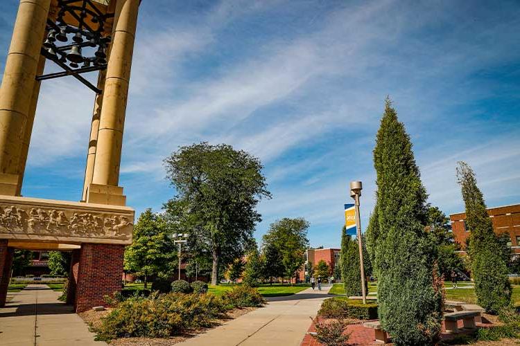 bet36365体育 bell tower and campus greens on a sunny day